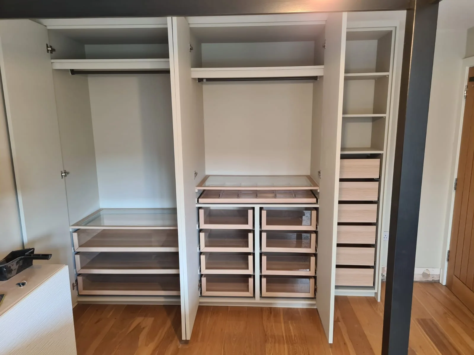 Bespoke wardrobe fitted around a chimney breast