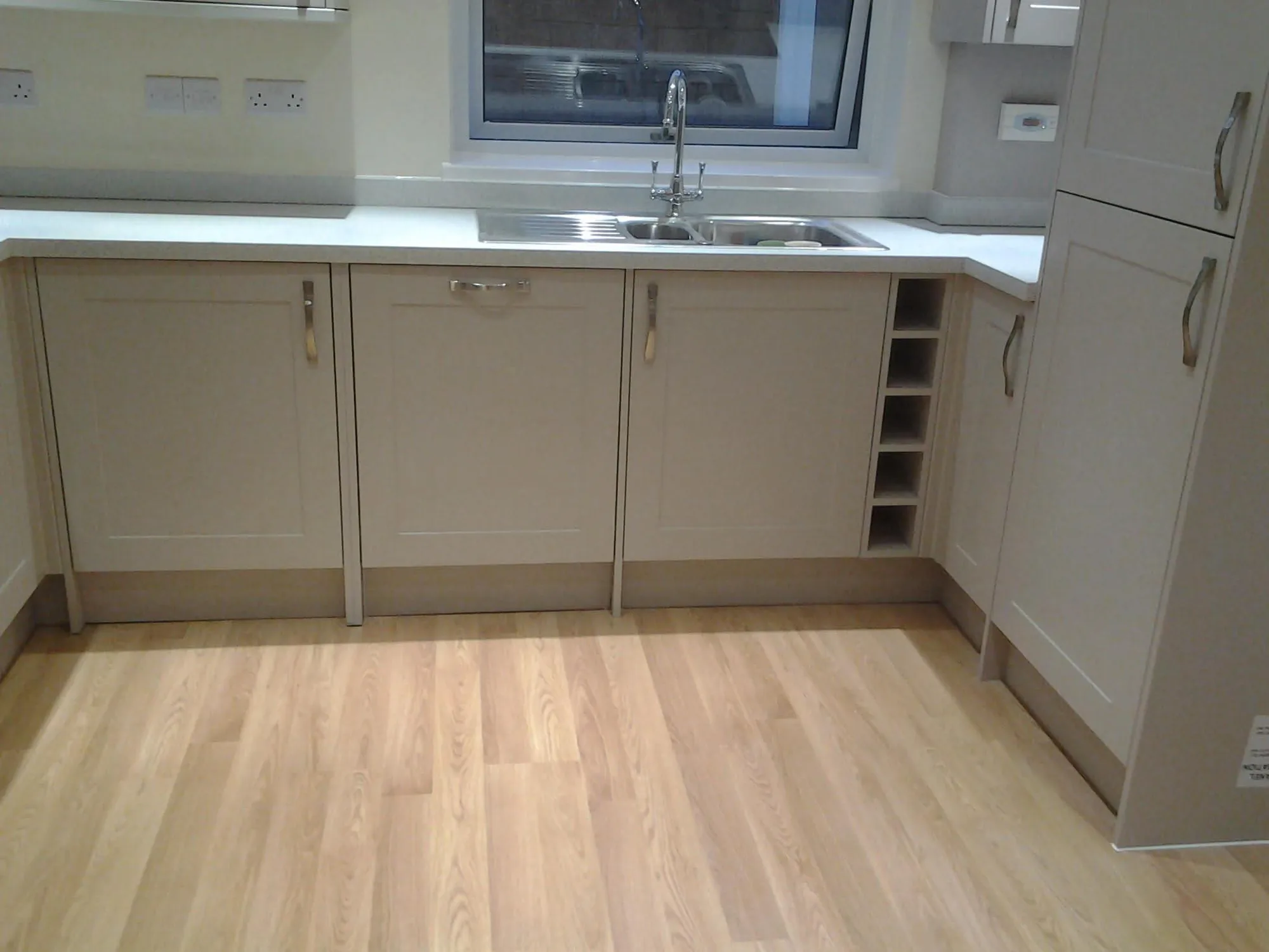 Kitchen units levelled and set out